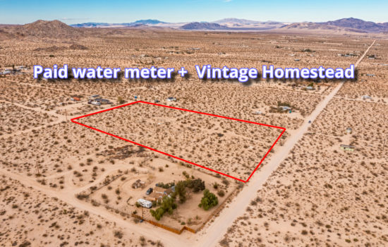 **Under Contract** Landers, CA vacant land with major improvements, Paid & Installed Water Meter, Metal Fence Around Homestead – Come grab this 5 acre paradise before it sells! Owner-financing with $10k down!